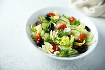 Healthy vegetable salad with olives