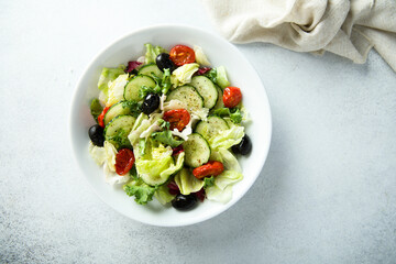 Healthy vegetable salad with olives
