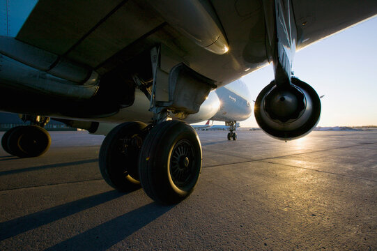 The underbelly of an aircraft on the runway at an airport in Montreal, Quebec, Canada.