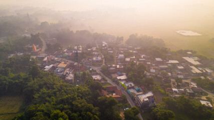 Aerial landscape view of a village in India, drone shot of Rural India during sunset or sunrise
