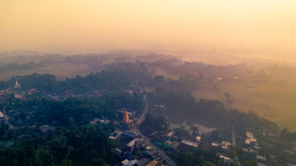Aerial landscape view of a village in India, drone shot of Rural India during sunset or sunrise