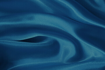 Dark blue fabric cloth texture for background and design art work, beautiful crumpled pattern of silk or linen.