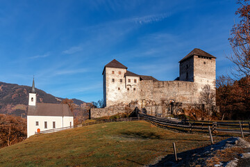 Fototapeta na wymiar Old medieval castle and St. Jacob Chapel, Kaprun, Austria