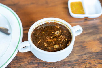 Rawon. traditional Indonesian beef black soup culinary
