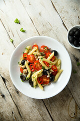 Pasta with tomatoes and olives