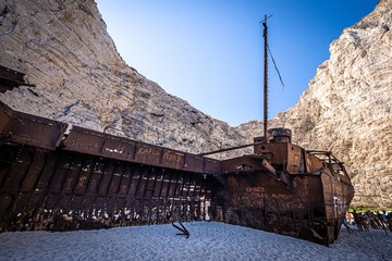 Fantastic view of the old rusty shipwreck stranded on the beach of Navagio (Smugglers Cove) on...
