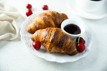 Freshly made croissants with berries