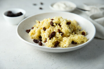 Homemade millet porridge with raisins