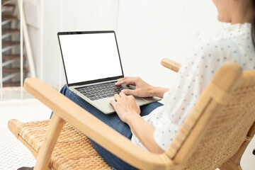 computer screen blank mockup.hand woman work using laptop with white background for advertising,contact business search information on desk at coffee shop.marketing and creative design