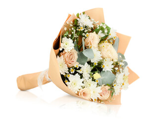bouquet of roses, chrysanthemums, daisies and eucalyptus leaves lying on a white isolated background
