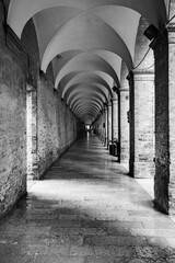 Beautiful places of Italy. Walking old streets of Urbino, city and World Heritage Site in Marche region, Italy. Black and White photography.