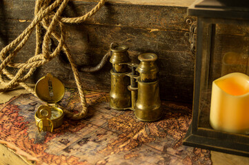 Fototapeta na wymiar Still life with antique objects related to adventure and exploration.