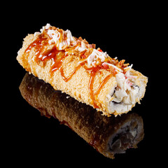 warm sushi roll hot dog in panko on a black mirror background