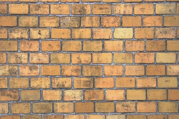 Schöne Fasade und Mauer aus Sandstein und Ziegel