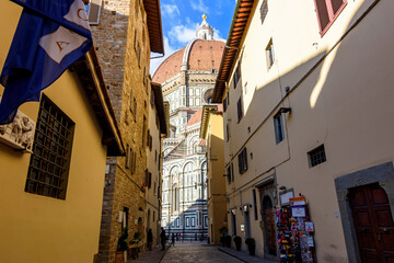 Streets of medieval Florence with Duomo cathedral, Italy