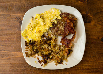 eggs, bacon, sausage and hash browns