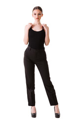 Fototapeta premium beautiful young model posing in photo studio on white background, dressed in black