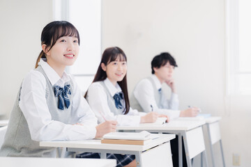 Fototapeta premium 教室で授業を受ける学生