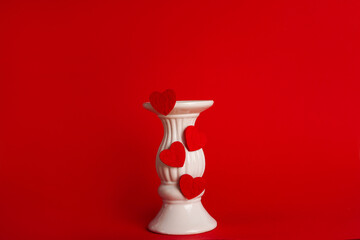 White podium with red hearts on red background to show cosmetic products. Minimal romantic backdrop...