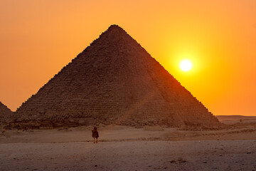 Fototapeta na wymiar Sunset over the pyramid of Menkaure in the Giza necropolis