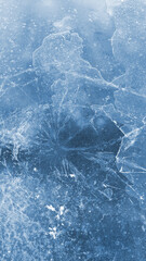 Brittle ice on the surface of a frozen river