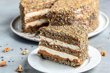 layered cake with cakes nut in condensed milk, Food recipe background. Close up. Layered poppy cake