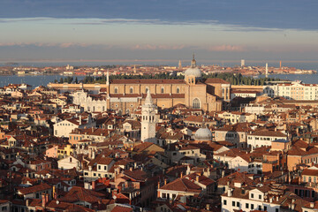 Fototapeta na wymiar Venice city from above. Beautiful panoramic view of Italian city. Golden hour photo of Italy. Romantic tourist destination concept. 