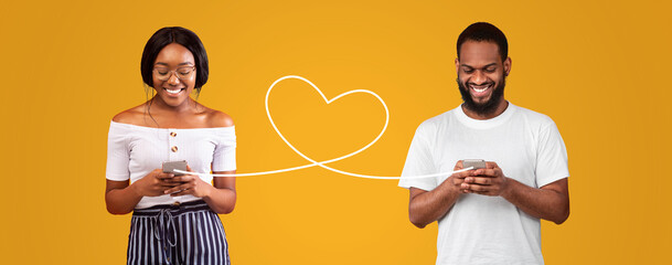 Happy Black Couple Messaging On Smartphones Connected With Drawn Heart Shape String