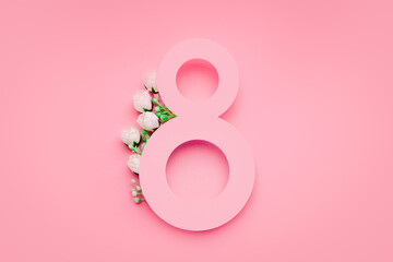Minimalistic postcard March 8. Number eight on a pink background with flowers