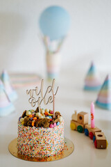 Fototapeta na wymiar First birthday cake and decoration