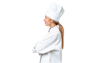 Young chef woman over isolated chroma key background in lateral position