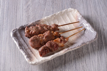 豚カシラの串焼き