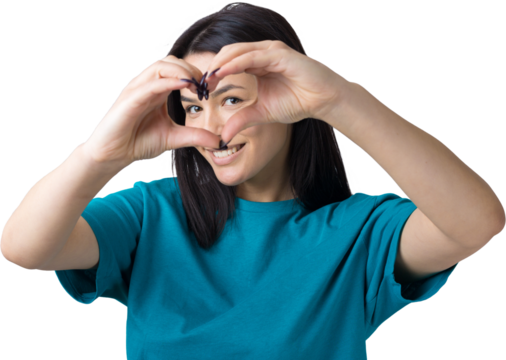 Portrait of a smiling young woman showing heart gesture with her fingers isolated over grey background - Powered by Adobe
