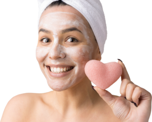 Beauty portrait of woman in white towel on head  with a sponge for a body in view of a pink heart. Skincare cleansing eco organic cosmetic spa relax concept.
