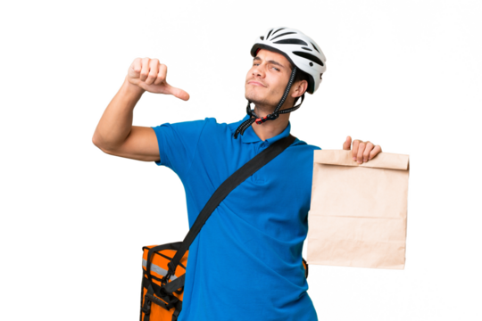 Young caucasian man taking a bag of takeaway food over isolated background proud and self-satisfied