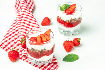 Parfait Greek yogurt with fresh strawberry and granola. gluten free diet, Healthy breakfast. banner, menu, recipe place for text, top view