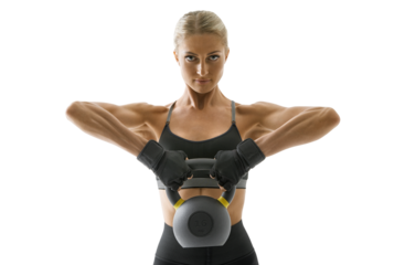 Portrait of a confident Fitness woman. Sportswoman in sportswear, gloves, black top and leggings trains arm muscles. Kettlebell workout.