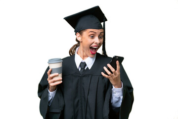 Young university graduate  caucasian woman over isolated background holding coffee to take away and a mobile