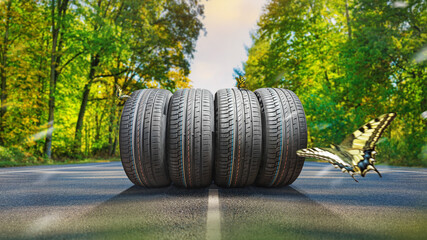 summer tires on the asphalt road in the sun - time for summer tires © Igor Link