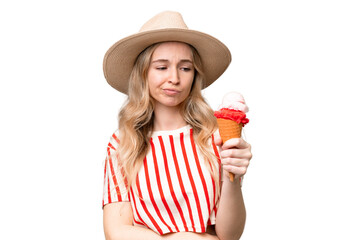 Obraz premium Young English woman with a cornet ice cream over isolated background with sad expression