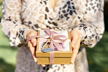woman holding a gift