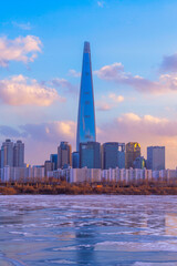 Seoul Subway and Lotte Tower at Night, In winter, the weather is cool and the sea is frozen. South korea