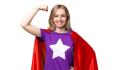 Young English woman over isolated background in superhero costume and doing strong gesture © luismolinero