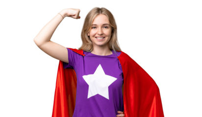 Young English woman over isolated background in superhero costume and doing strong gesture