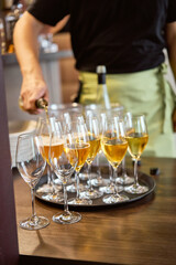 waiter serving champagne