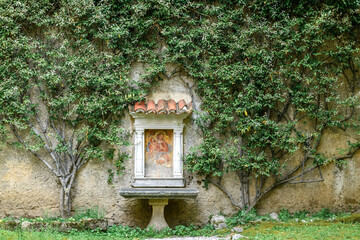 Main cloister of Certosa of The Certosa di Padula well known as Padula Charterhouse is a monastery...