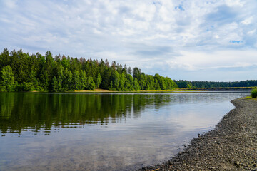 Fototapeta premium Landscape at the Unterer Haus-Herzberger Teich. Nature at the lake near Clausthal-Zellerfeld in the Harz National Park. Former mining pond. 