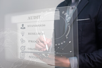 Audit for ISO standard, quality assurance for certification, an international process for improve industry. business man using tablet for audition.