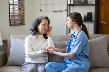 Female doctor holding female patient hands with compassion and comfort for encouragement and empathy.