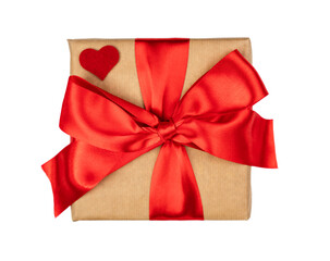 Wrapped gift box with red ribbon bow isolated on white background. Valentine's Day. Close-up. Top view. Flatlay. Selective focus.